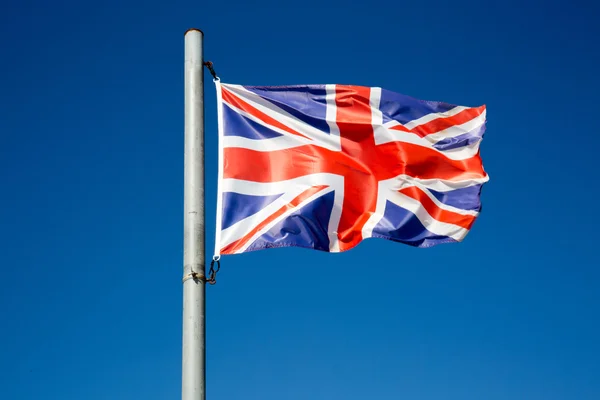 Drapelul britanic flutură în vânt, Marea Britanie sau drapelul regatului unit — Fotografie, imagine de stoc
