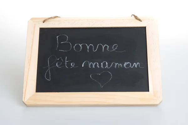 La frase feliz día de las madres escrito en francés — Foto de Stock