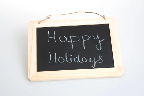 Happy Holiday - biała kreda pisma na wzór łupków na białym tle — Zdjęcie stockowe