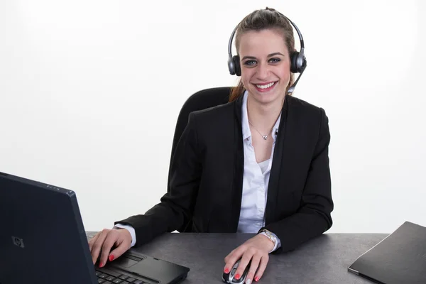Support telefon szereplő fejhallgató a munkahelyen — Stock Fotó