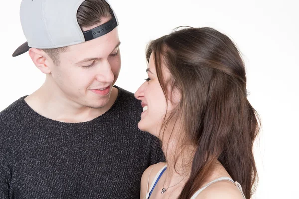 Two young happy couple embrace look against each other  - — Stock Photo, Image