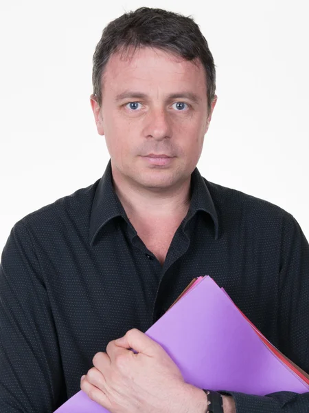 Confident  businessman carrying folders  in office — Stock Photo, Image