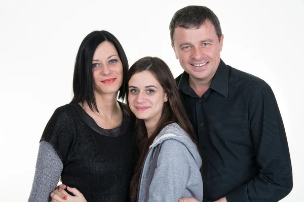 Portret van gelukkige familie van drie met tiener — Stockfoto