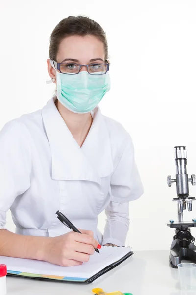Woman doctor with a mask  looking at the camera Stock Image