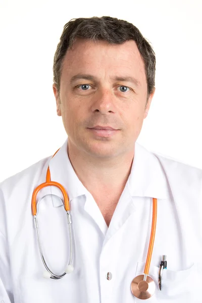 Happy doctor smiling at camera on white background — Stock Photo, Image