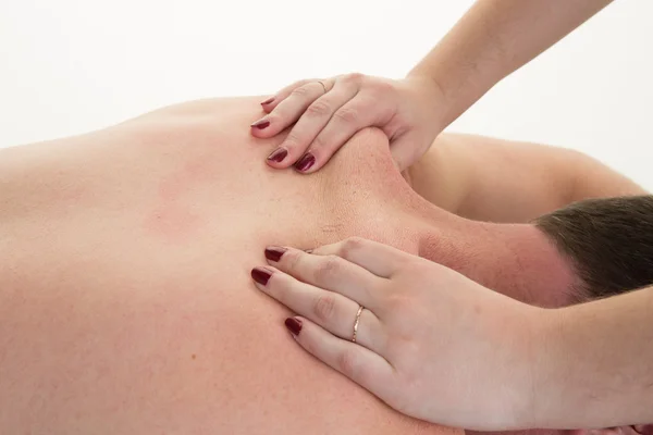 Close-up van iemands rug met een massage in een kuuroord — Stockfoto