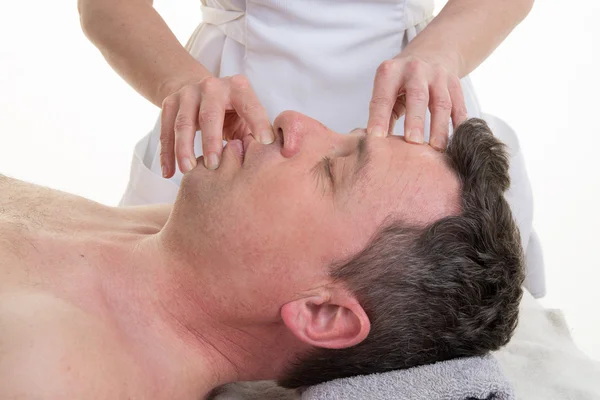 Facial and cranial osteopathy therapy in a medical room — Stock Photo, Image