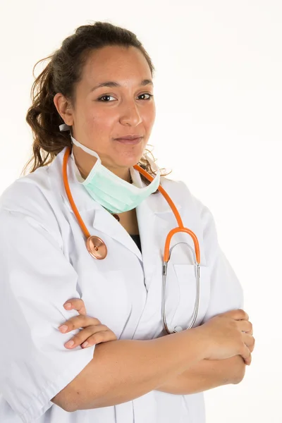 Friendly female doctor with mask crossed arms — Stock Photo, Image