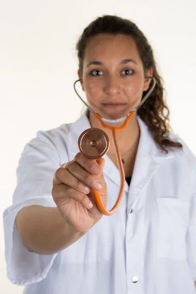 Friendly female doctor smiling - isolated over  white background — Stock Photo, Image