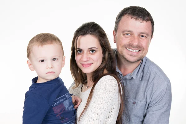 Família feliz no fundo branco com filho — Fotografia de Stock