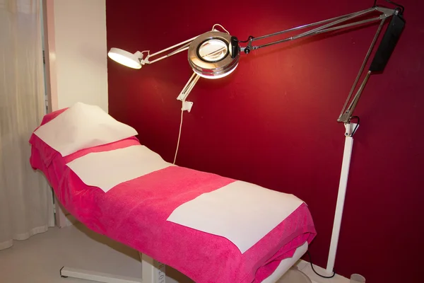 Interior of a red and pink massage room — Stock Photo, Image