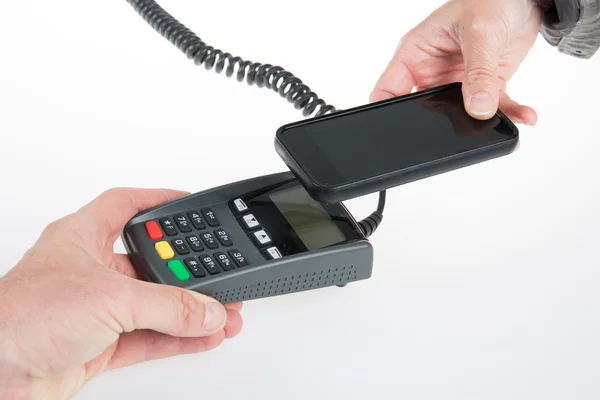 Imagem de pessoas que usam a tecnologia NFC para pagar contas — Fotografia de Stock