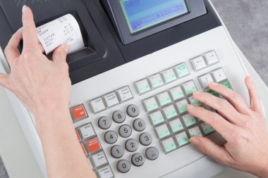 Cash Register and euro money in the till clipart