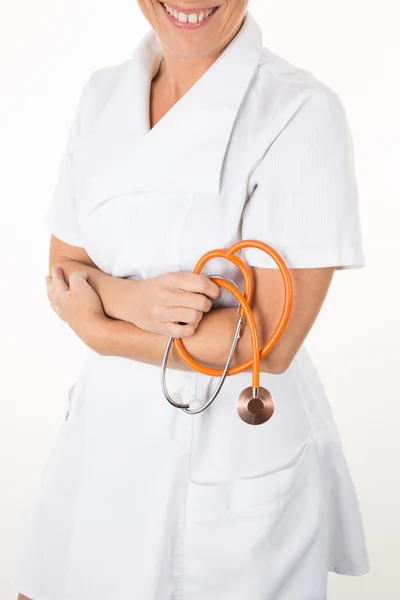 Doktor ženská ruka držící stetoskop — Stock fotografie