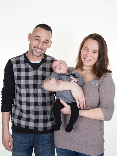 Junge Familie mit einem netten und süßen Baby im Stehen — Stockfoto