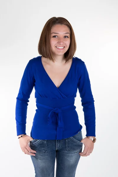 Mujer vistiendo top azul y jeans aislados — Foto de Stock