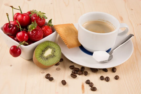Cup of coffee, cake and fruits for healthy breakfast — Stock Photo, Image