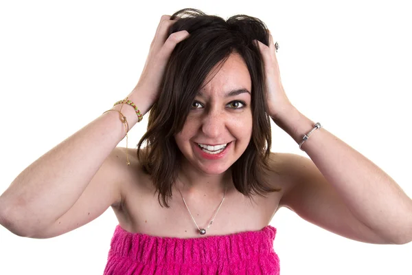 Mulher olha e corre suas mãos através de seu cabelo — Fotografia de Stock