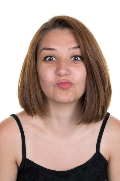 Portret van brunette jonge vrouw doet gek en dwaas gezichten — Stockfoto