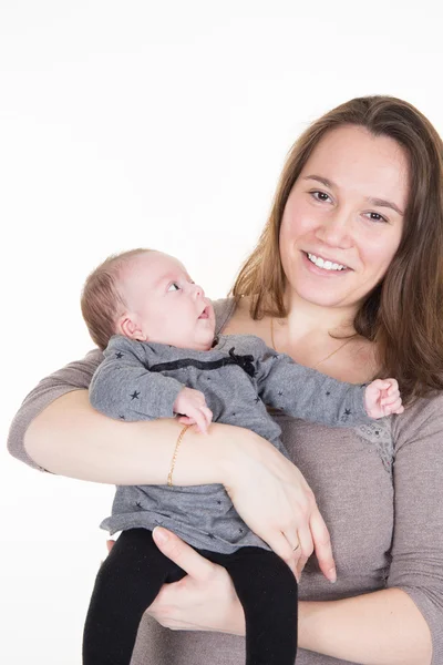 Mãe com sua filhinha nas mãos — Fotografia de Stock