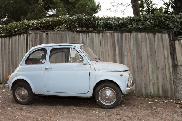 Miniature blue car outside for holidays summertime — Stock Photo, Image