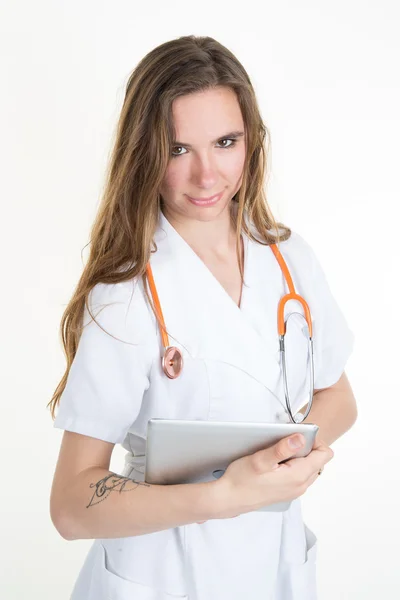 Two cheerful doctors using a digital tablet. Isolated on white — Stock Photo, Image