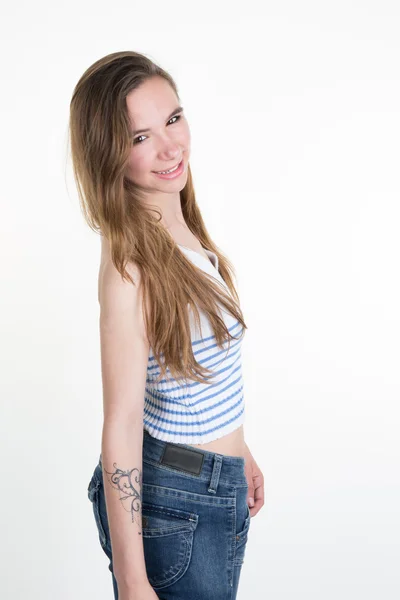 Linda adolescente loira em jeans confortáveis isolado — Fotografia de Stock