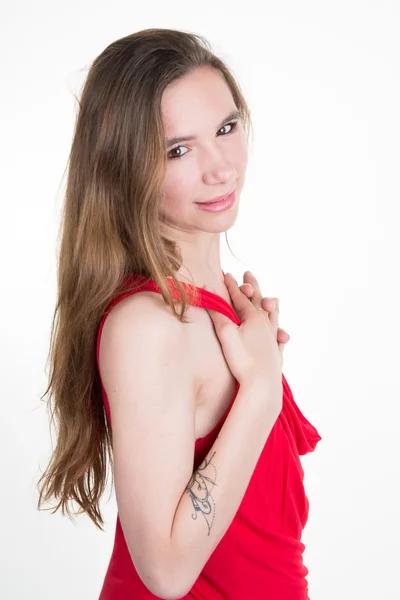 Charming woman portrait. Female young model isolated. Red dress . — Stock Photo, Image