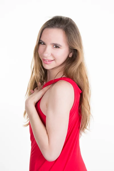 Retrato sonriente de mujer de moda. Modelo joven femenino aislado. Vestido rojo  . — Foto de Stock