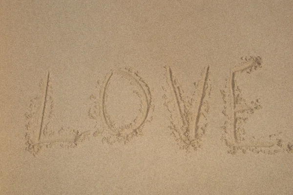 Scrivi amore sulla spiaggia, messaggio d'amore — Foto Stock