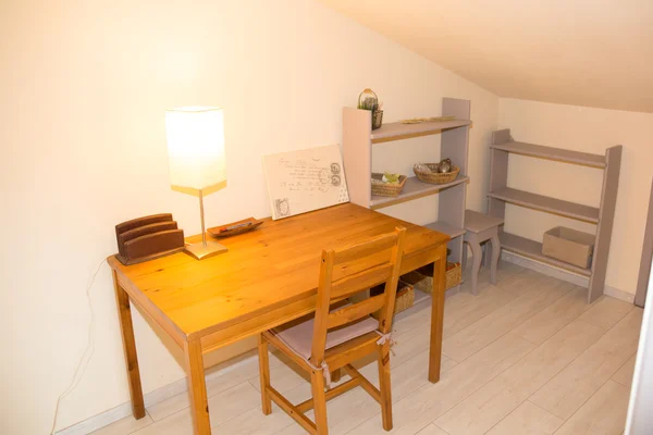 Wooden well arranged desk prepared to work