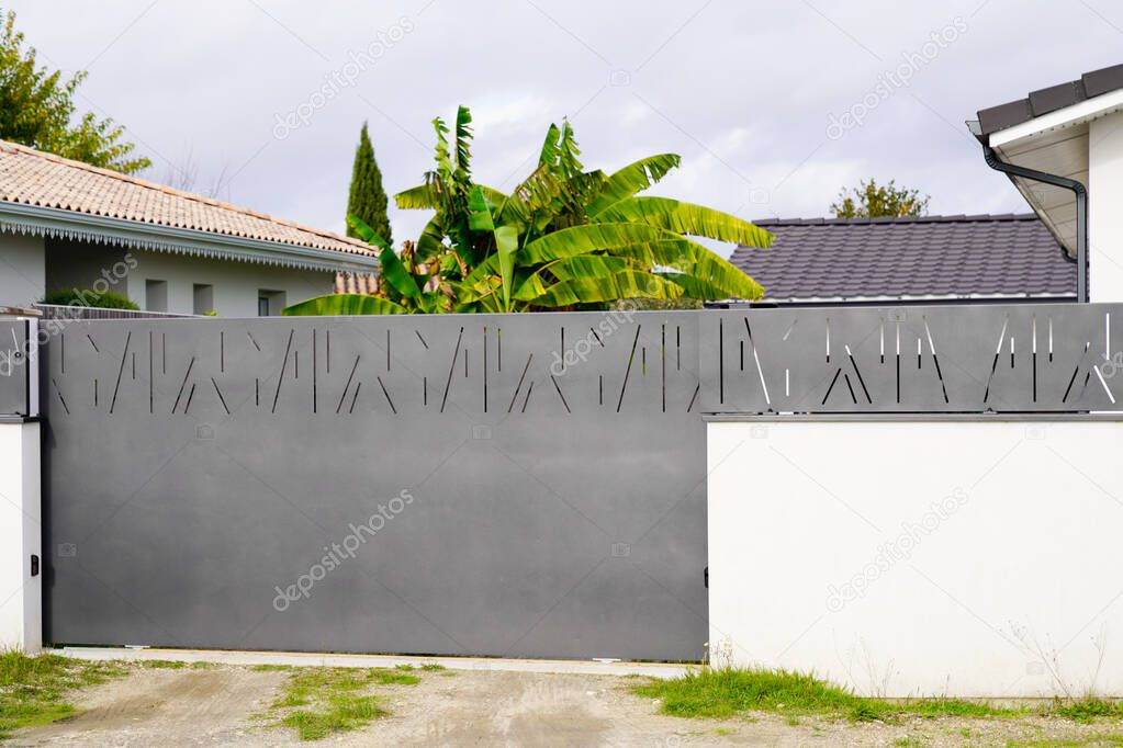 sliding gate grey brut steel big gray metal portal fence on modern design house street