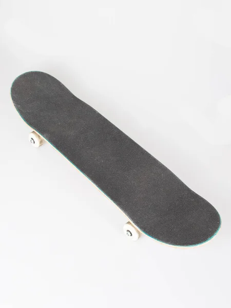 Skateboard Enda Svart Bräda Ovanifrån Isolerad Vit Bakgrund — Stockfoto