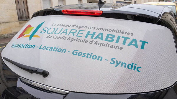 Bordeaux , Aquitaine  France - 01 05 2021 : square habitat sign text and logo of french real estate store broker office company on advertising car windows