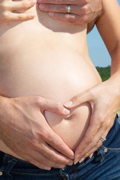 Pregnant Woman Man Embracing Naked Topless Abdomen Belly Hands Outdoor — Stock Photo, Image