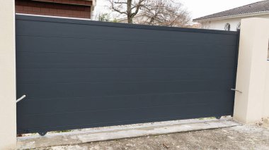 Gri, siyah ev çeliği sürgülü kapı alüminyum kapı levhaları