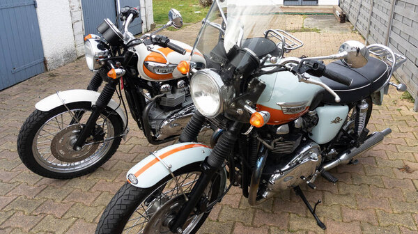 Bordeaux , Aquitaine France - 02 05 2021 : two triumph bonneville t100 neo retro old school vintage motorbike outdoor