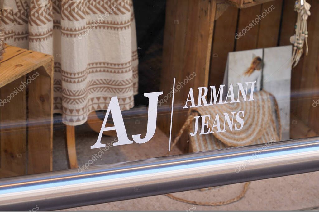 Toulouse , occitanie France  - 06 25 2021 : Armani Jeans shop sign brand and text Logo of store clothing company made denim jeans