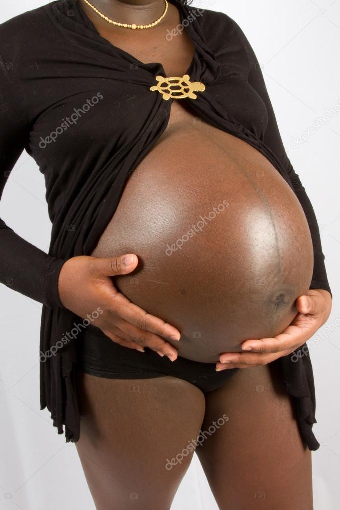 Black woman pregnant. 