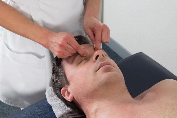 Man in Spa massage salon, relaxing