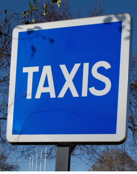 Blå taxi tecken — Stockfoto