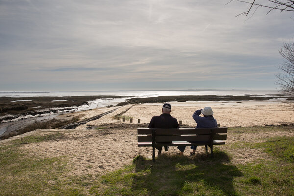 Rear view of a happy romantic senior couple