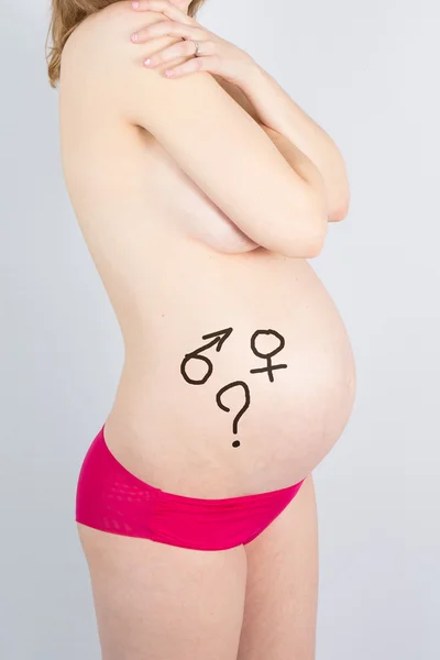 Bonito vientre de una mujer embarazada agradable —  Fotos de Stock