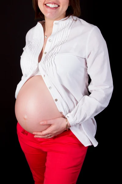 Barriga linda e agradável de uma mulher — Fotografia de Stock