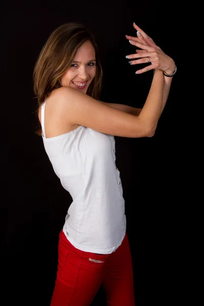 Beautiful brunette girl dancing — Stock Photo, Image