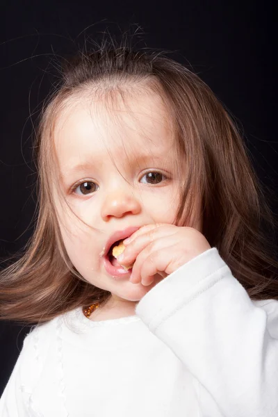 Bebê menina sorrindo um sorriso feliz — Fotografia de Stock