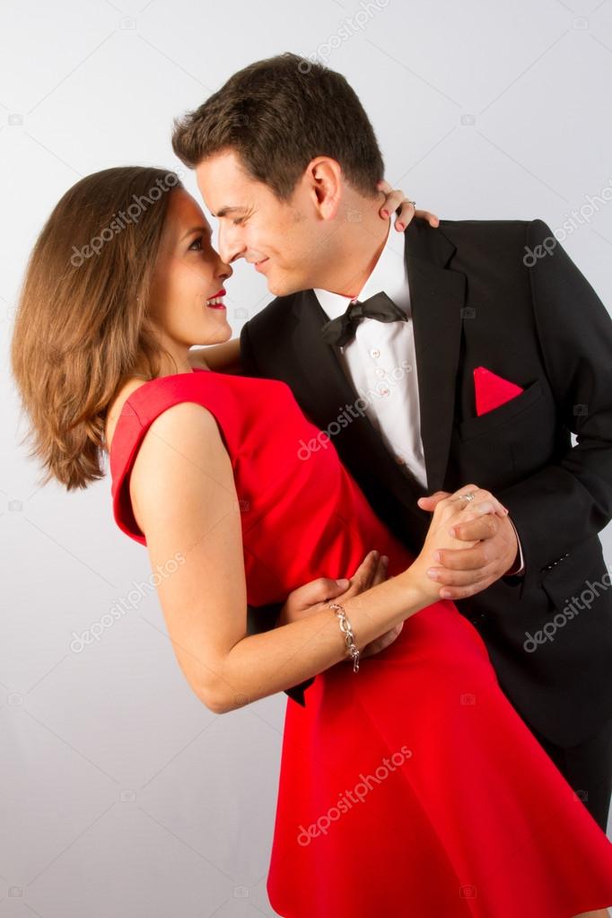 Young couple tuxedo and dress in love