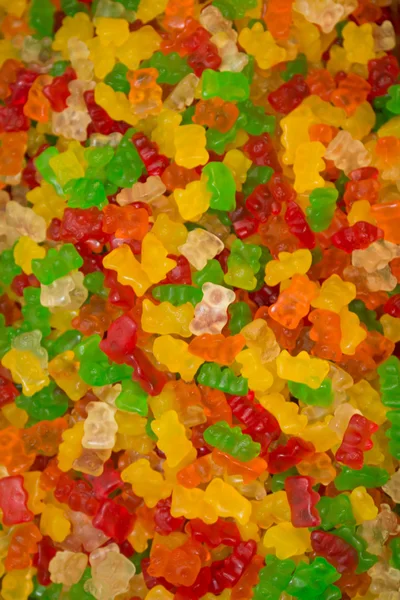 Kolorowy gummy niedźwiedzie na tle — Zdjęcie stockowe