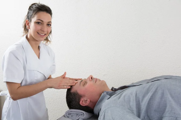 Face massage in spa salon — Stock Photo, Image