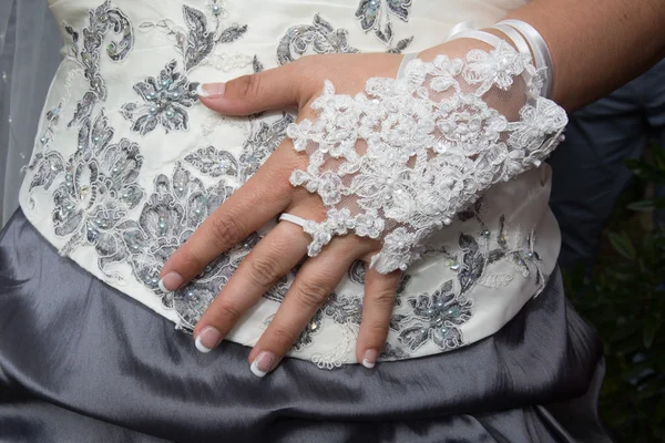 Very Beautiful Bride hands on wedding dress — ストック写真